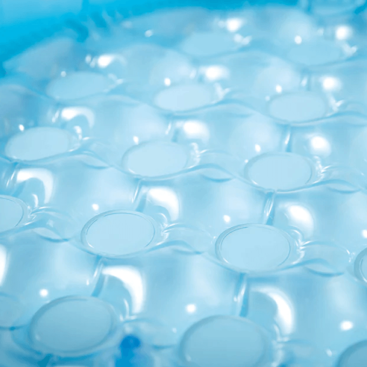 Close-up of the soft, inflated bubble textured floor of the Intex toddler wading pool designed for baby comfort.
