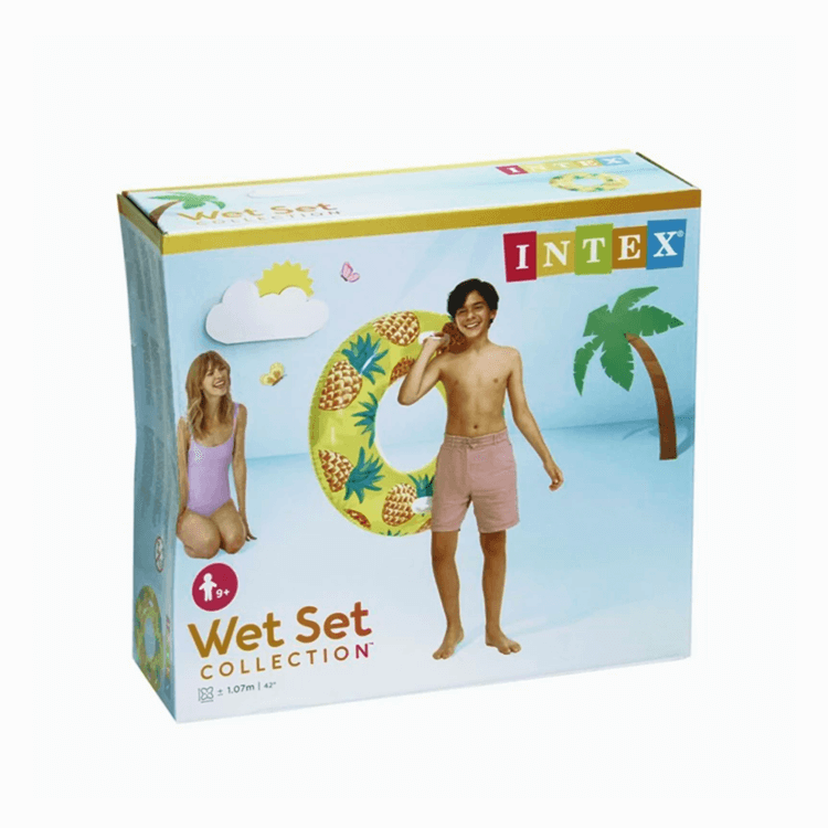 Intex Wet Set Collection packaging for the 42-inch inflatable Pineapple swim tube pool float featuring two white handles, showing a smiling boy carrying it on his shoulder at the beach.