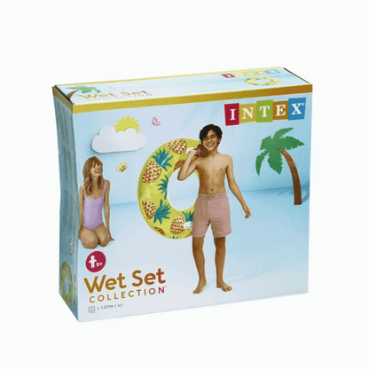 Intex Wet Set Collection packaging for the 42-inch inflatable Pineapple swim tube pool float featuring two white handles, showing a smiling boy carrying it on his shoulder at the beach.