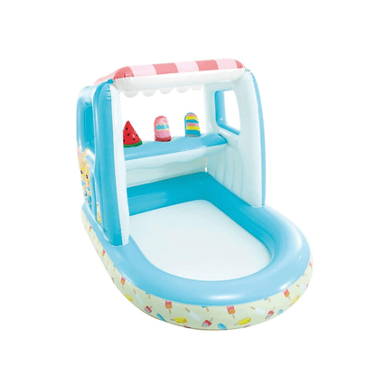 Inside view of the Gelato inflatable play center showing the counter with three removable inflatable popsicles and watermelon toys.