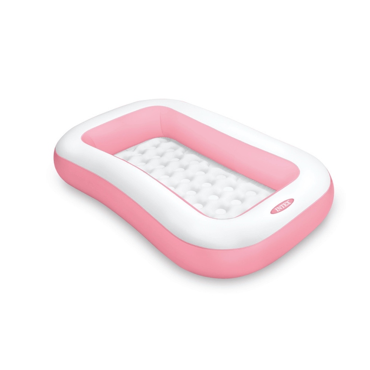 Angled view of the Intex rectangular pink inflatable baby pool featuring a soft white padded bubble floor.